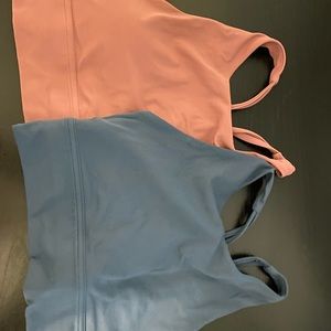 Two high neck sports bras